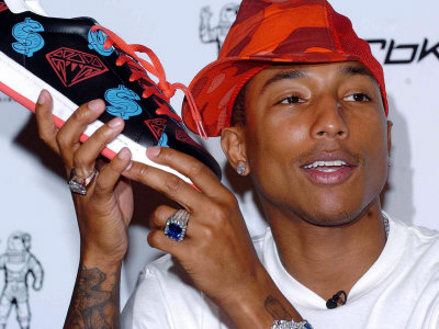 top-american-rap-artist-and-producer-pharrell-williams-august-2004.jpg